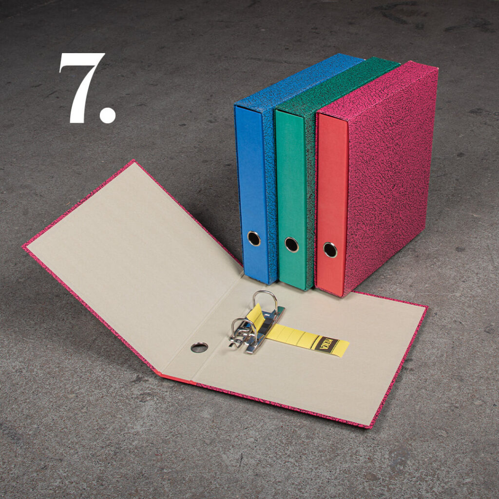 Merca mapit, sininen, vihreä ja punainen koteloilla.